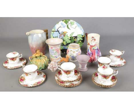 A box of ceramics. Includes Royal Albert Old Country Roses, Royal Doulton Lady figure, Carltonware jug, Poole, etc.  