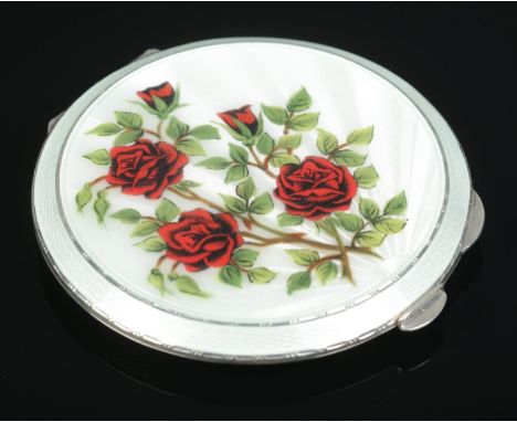 A silver and enamel compact with rose decoration. Assayed Birmingham 1961 by Henry Clifford Davis. 81.98g.  