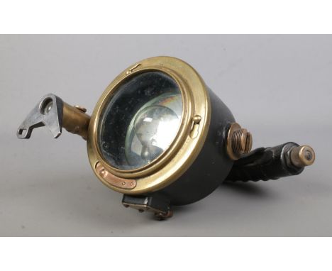A World War Two Admiralty Pattern 5110E portable signalling lantern. Dated 1944.  