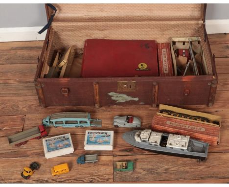 A suitcase of mostly model railway and diecast vehicles. Includes Schuco, Hornby Dublo, Trix Twin set railway set,  two boxed