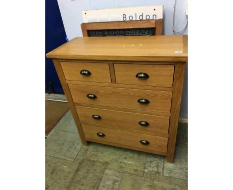 A small light oak chest of drawers, 85cm wide
