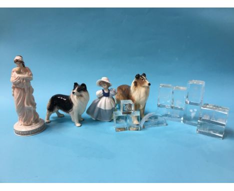 A Wedgwood and Nao figure, two dogs and a quantity of paperweights
