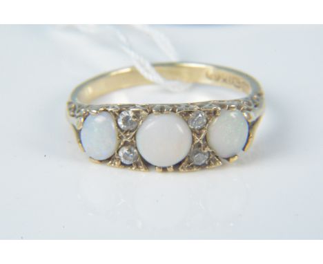 A 9ct gold opal and white stone set ring, size M 1/2, weight approx 2.8g