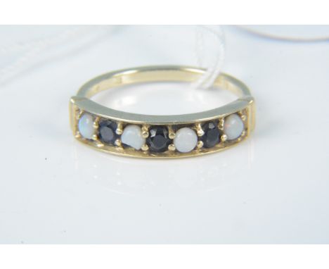 A 9ct gold opal and sapphire set ring, size N, weight approx 2g