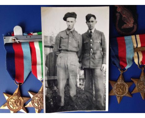 A photograph of two unknown WWII service men, presumably taken in a back garden at home, one 8th Army, the other RAF, accompa
