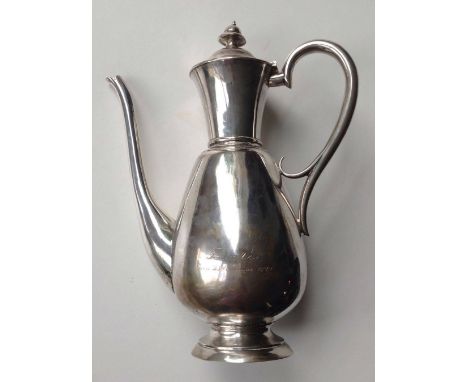 A continental white metal coffee pot of plain design, bearing presentation inscription – 'Fra en Ven. Den 25 Februar 1877' – 