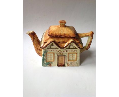 A cottage ware teapot – 'Festival of Britain 1951'.