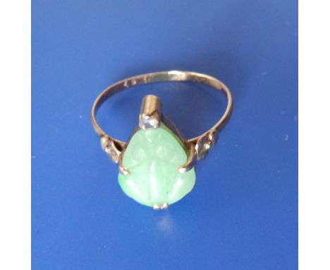 A jade solitaire ring.