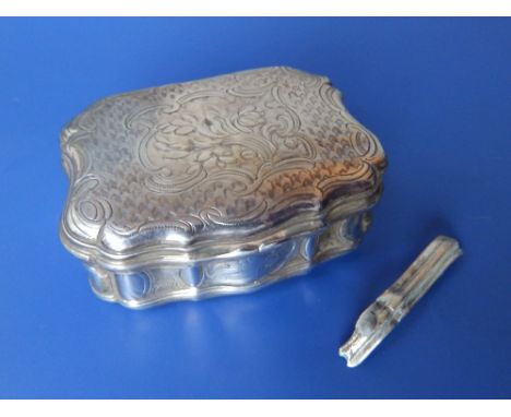 A 19thC continental silver shaped rectangular snuff box, having rococo style foliate engraving – one section of moulded edge 