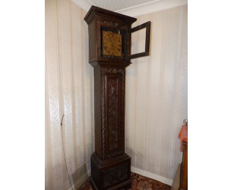 A brass dial bell striking 30 hour carved oak longcase clock, the 10” square dial inscribed 'Avenell, Farnham', 83”.