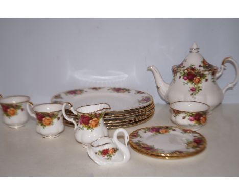 Royal Albert old country rose, 6 large plates, 2 small plates, 2 cups, 1 teapot, 1 sugar, 1 milk &amp; 1 other