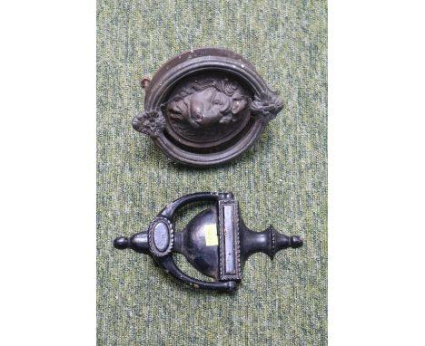 Cast Iron Circular Lions face door knocker and a Regency style door knocker 