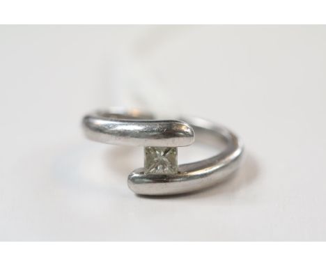 Ladies Platinum Diamond Princess Cut ring of cross over design Size L. 10g total weight Estimated 0.30ct 