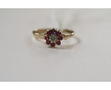Ladies 9ct Gold Ruby &amp; Diamond set cluster ring Size L. 1.5g total weight 