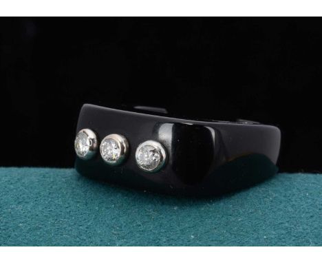 A contemporary three stone diamond ceramic dress ring, af
