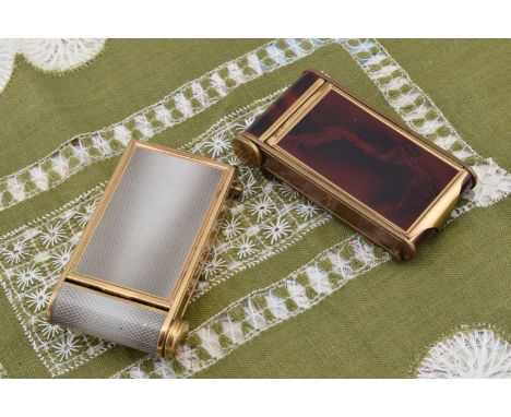 Two German Kamra gilt metal enamel decorated musical compacts, Two German Kamra gilt metal enamel decorated musical compacts,