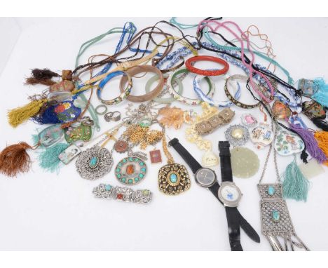 A collection of jade and bowenite Chinese jewels, bangles, pierced pendants, rings, together with porcelain silver mounted Ch