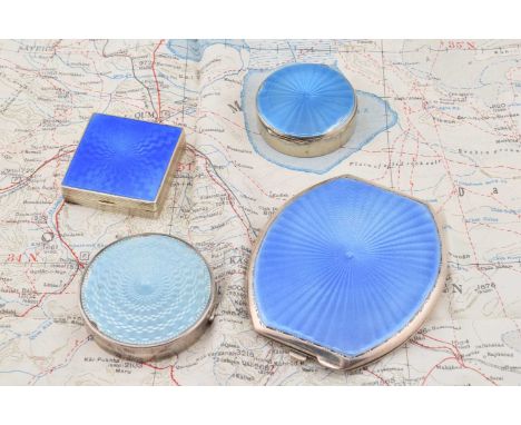 Four silver blue guilloche enamel mounted compacts, Four silver blue guilloche enamel mounted compacts, including a square Fr