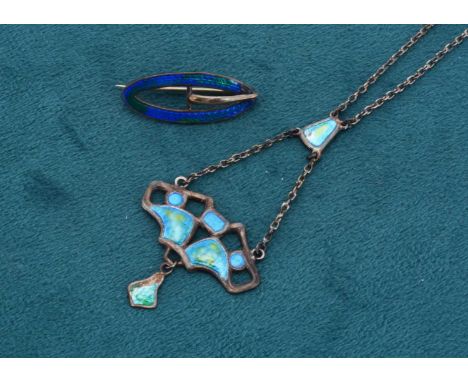 An Edwardian VII, Art Nouveau silver and enamel pendant and chain, by Charles Horner, open pierced design with ovoid drop, 25