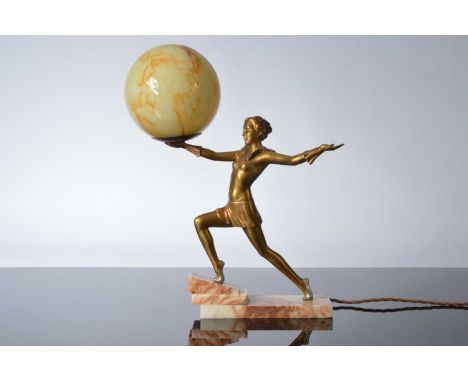 An Art Deco gilt spelter figural lamp base after Josef Lorenzl, the brown hardstone stepped base supported a young lady in lu