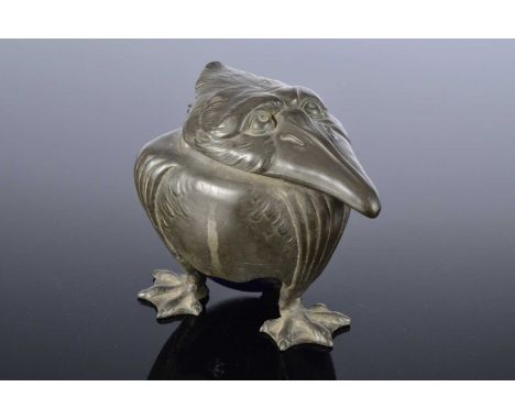 An Art Nouveau period pewter and blue pottery novelty inkwell by Kayserzinn, 11cm high, modelled as a three legged grotesque 