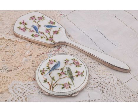 A silver hand dressing table mirror, A silver hand dressing table mirror, having white guilloche enamelled decoration with bl