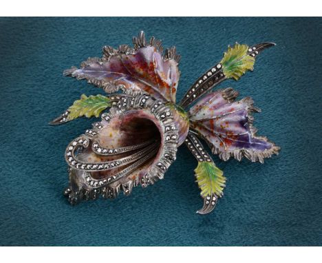 A large silver enamel and marcasite floral brooch, decorated in purple and green enamel heightened in marcasites, 8cm x 6cm, 