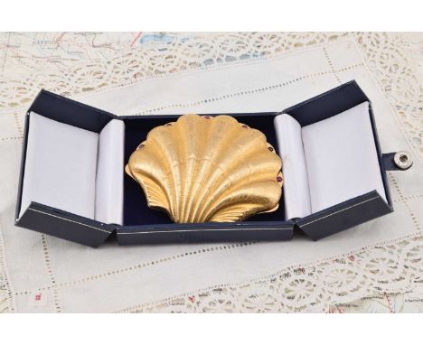 A 9 carat gold Asprey clam shell compact, A 9 carat gold Asprey clam shell compact, of textured realistic form having powder 