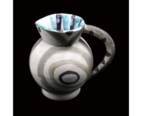 A ceramic jug by Pablo Picasso in a hand painted Bird design, Glazed interior with a bisque interior, impressed marks D'APRES