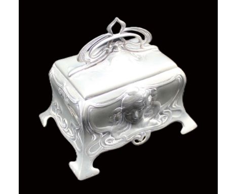 A WMF silver plated ornate trinket box, of elegant shape on four axe head splayed feet, with elaborate cast female head desig