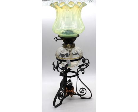 An Arts & Crafts, early 20th century oil lamp on cast metal and copper base with Hinks No2 Duplex chamber, flume and vaseline
