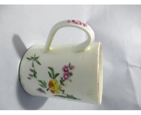 A Worcester 1st period famille rose painted mug with ribbed handle on floral base, H 8.5cm W 9.8cm D 7cm