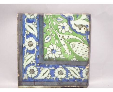 A C16th-C17th tile in Ottoman Iznik style manufactured in Damascus, Syria. A corner tile with foliate border in cobalt blue a