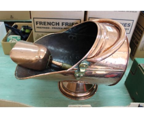 A 19th Century copper coal helmet and scoop