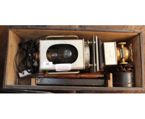 A cased Kamms patent slide projector, The Kama, this item is sold as a collectors item only and has not been subject to an el