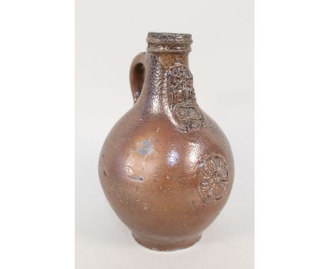 An 18th Century mask Bellarmine flagon, height 9" (light body crack)
