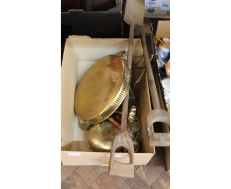 A brass blow lamp plus other brass ware and two small wooden shovels