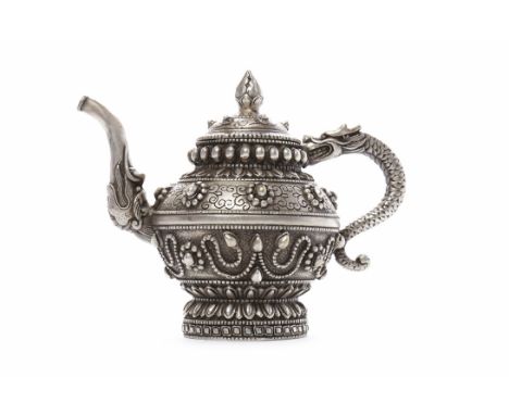 MID 20TH CENTURY CHINESE WHITE METAL TEA POT with dragon handle and elephant trunk spout, 14cm high 