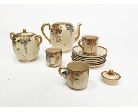 AMENDMENT TO COMPRISING PIECES:EARLY/MID 20TH CENTURY JAPANESE SATSUMA PART TEA SERVICEcomprising three cups, six saucers, te