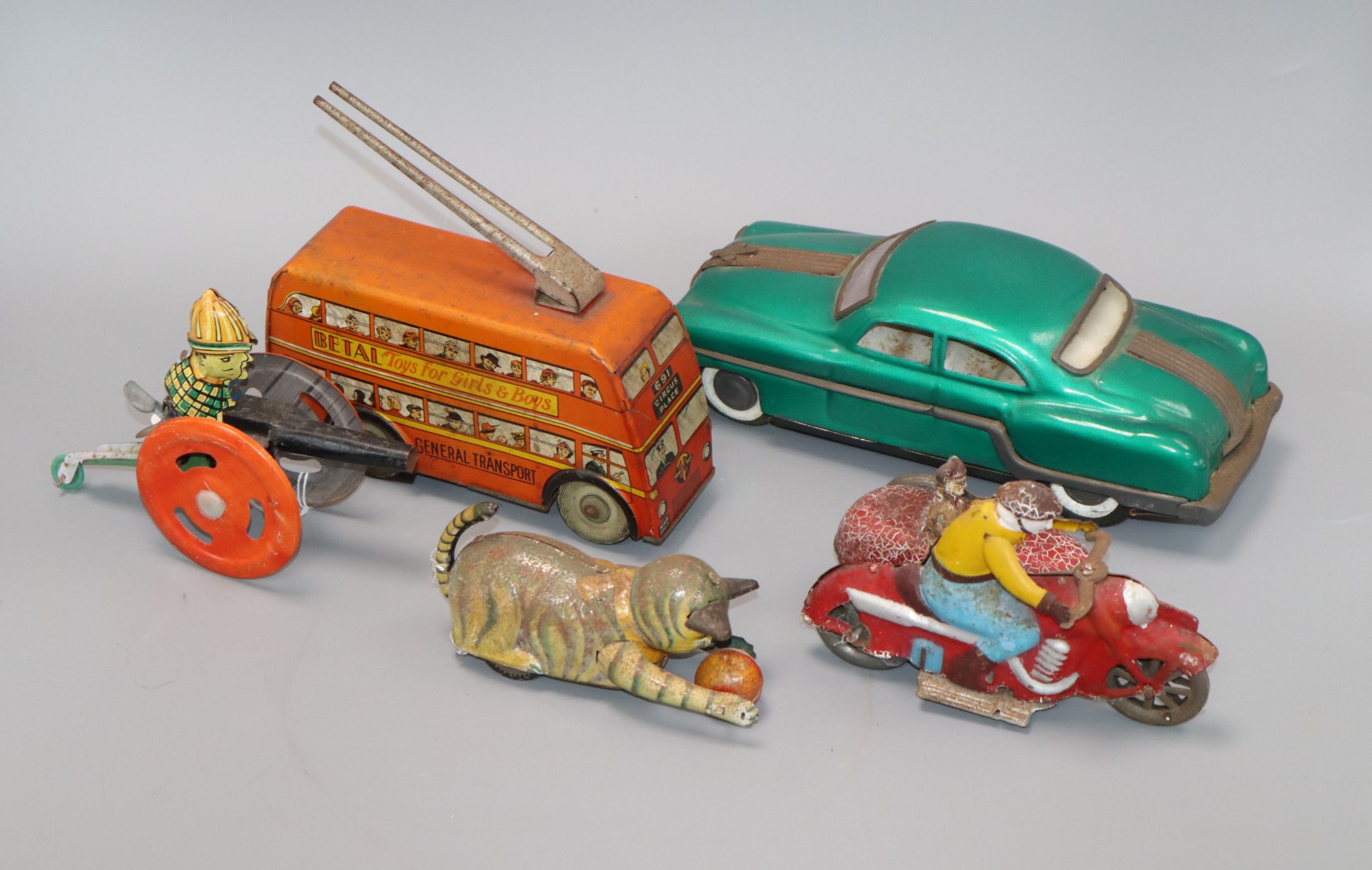 Five various tin plate toys