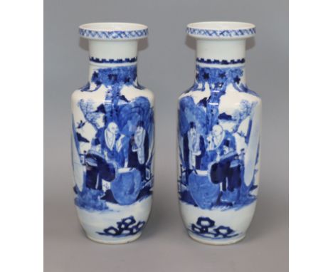 A pair of late 19th century Chinese blue and white vases, bearing Kangxi mark height 29.5cm