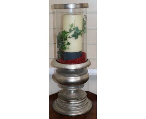 A silvered metal storm light height 57cm