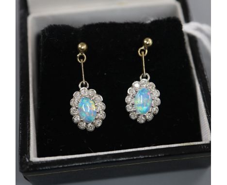 A pair of 9ct, black opal and diamond set oval cluster drop earrings, drop 18mm.