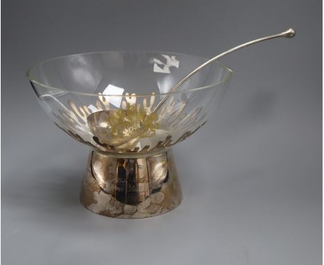 A Mappin and Webb Silver Jubilee commemorative silver mounted glass punch bowl with gilded crest and matching ladle, London, 