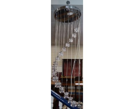 A contemporary 'ice cube' spiral cluster glass and chrome pendant ceiling light