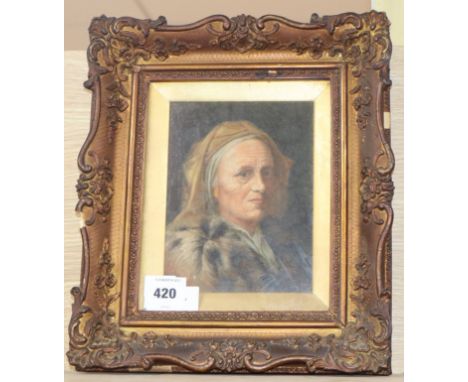 Continental School, oil on board, Portrait of a woman wearing a fur coat, indistinctly signed, 19 x 15cm.