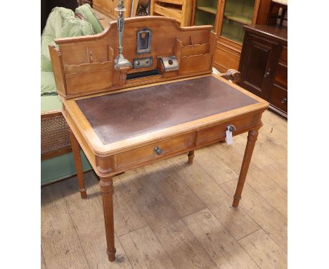 A Continental mahogany desk W.91cm