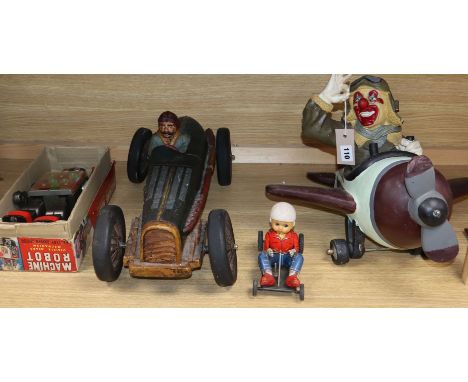 A "Machine robot" toy, boxed, a tin plate racer, a clown pilot and a similar car