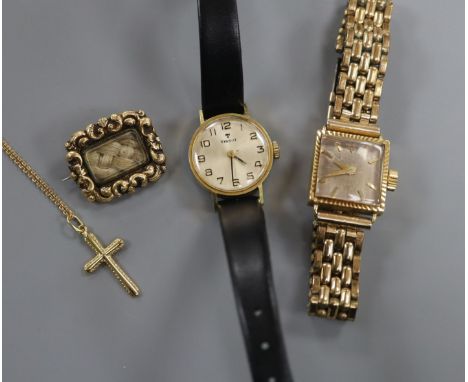 A Cortebert 18k 750 cased ladys' wristwatch, a 375 cross pendant on fine chain, a pinchbeck mourning brooch and another watch