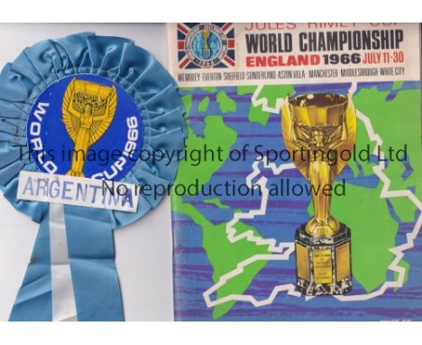 1966 WORLD CUP   Tournament brochure for the 1966 World Cup plus an original Argentina rosette.   Good